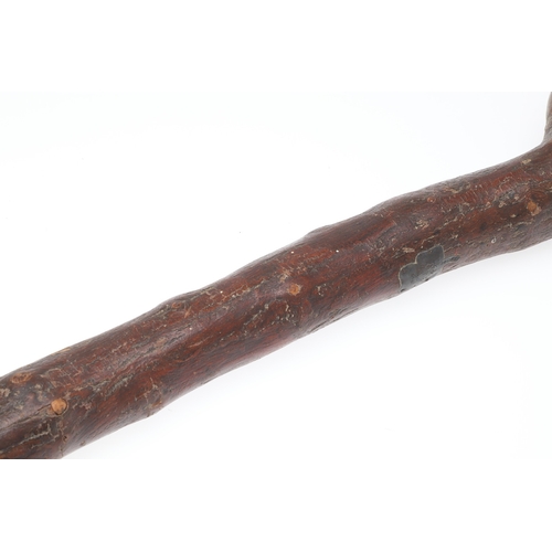 134 - AN IRISH SILVER MOUNTED SHILLELAGH. An Irish Shillelagh of traditional form, the end carved with a t... 