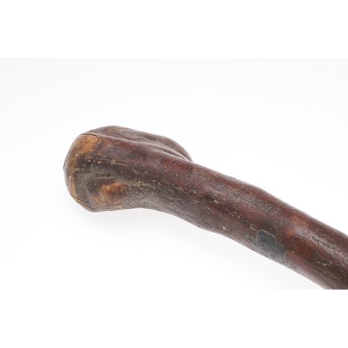 134 - AN IRISH SILVER MOUNTED SHILLELAGH. An Irish Shillelagh of traditional form, the end carved with a t... 