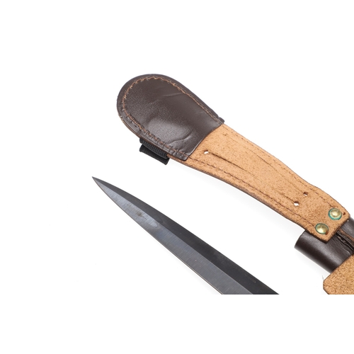 141 - A THIRD PATTERN FAIRBURN SYKES TYPE FIGHTING KNIFE BY WILLIAM RODGERS. With a 17cm double edged poin... 