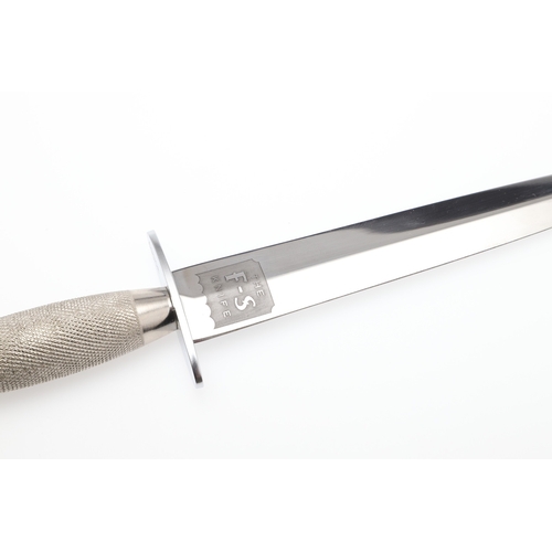 144 - A RECENT FAIRBAIRN SYKES TYPE KNIFE BY JOSEPH RODGERS. With a 17 cm pointed blade marked 'Joseph Rod... 