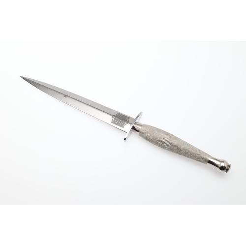 144 - A RECENT FAIRBAIRN SYKES TYPE KNIFE BY JOSEPH RODGERS. With a 17 cm pointed blade marked 'Joseph Rod... 