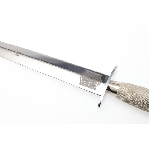 144 - A RECENT FAIRBAIRN SYKES TYPE KNIFE BY JOSEPH RODGERS. With a 17 cm pointed blade marked 'Joseph Rod... 