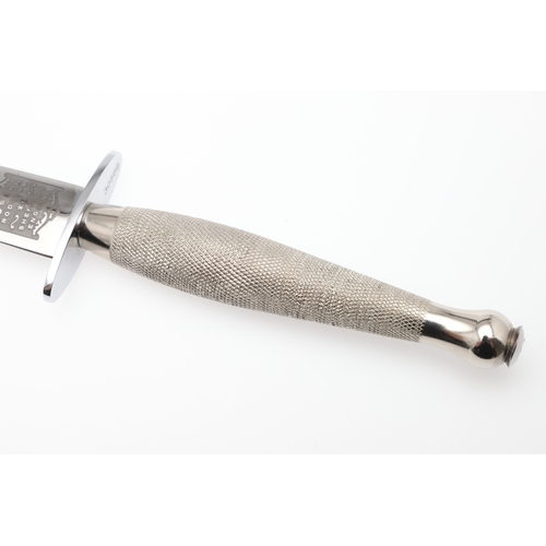 144 - A RECENT FAIRBAIRN SYKES TYPE KNIFE BY JOSEPH RODGERS. With a 17 cm pointed blade marked 'Joseph Rod... 