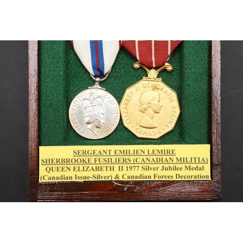 1001 - A QUEEN ELIZABETH II 1977 SILVER JUBILEE MEDAL AND CANADIAN FORCERS DECORATION. A pair comprising El... 