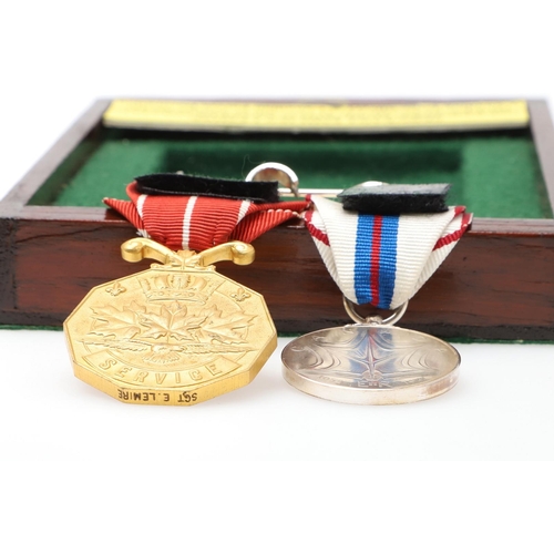 1001 - A QUEEN ELIZABETH II 1977 SILVER JUBILEE MEDAL AND CANADIAN FORCERS DECORATION. A pair comprising El... 