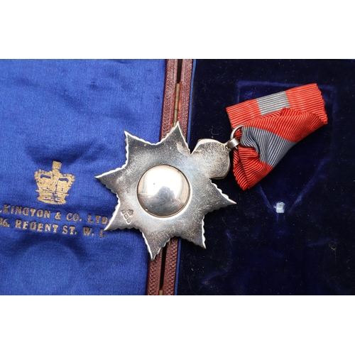 1008 - A GEORGE V IMPERIAL SERVICE ORDER. An Imperial Service Order on pin-backed red and blue ribbon, hall... 