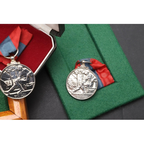 1009 - A COLLECTION OF IMPERIAL SERVICE MEDALS. A family pair of Imperial Service Medals comprising a Georg... 