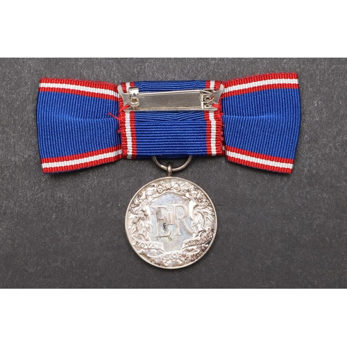 1011 - AN ELIZABETH II ROYAL VICTORIAN MEDAL. A Royal Victorian Order, 2nd type Elizabeth II issue on lady'... 