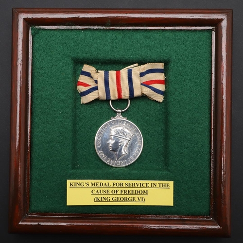 1012 - THE KING'S MEDAL FOR SERVICE IN THE CAUSE OF FREEDOM. The King's Medal for service in the cause of F... 