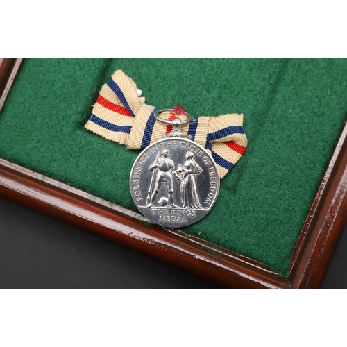 1012 - THE KING'S MEDAL FOR SERVICE IN THE CAUSE OF FREEDOM. The King's Medal for service in the cause of F... 