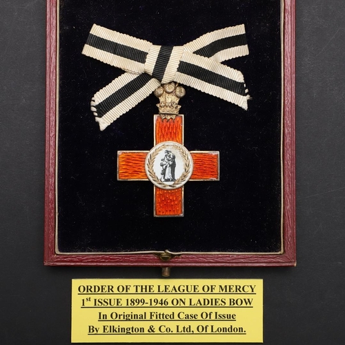 1015 - A MEDAL FOR THE ORDER OF THE LEAGUE OF MERCY. A cross of the Order of the League of Mercy, red ename... 