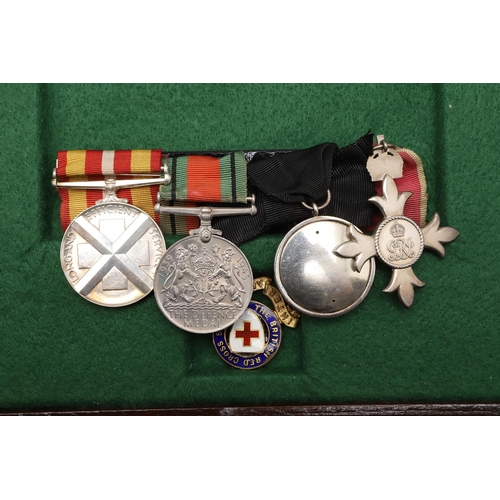 1017 - A BRITISH EMPIRE GROUP OF FOUR NURSING MEDALS TO A SERVING SISTER. A group of four comprising Member... 