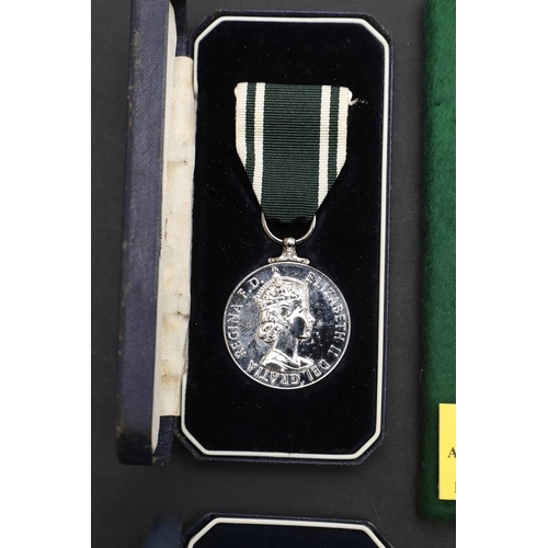 1019 - A COLLECTION OF ORDER OF ST JOHN AWARDS, AMBULANCE AND POLICE LONG SERVICE AWARDS. An Ambulance Serv... 