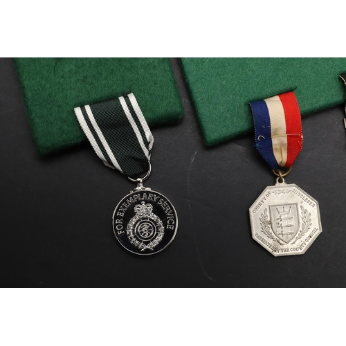 1019 - A COLLECTION OF ORDER OF ST JOHN AWARDS, AMBULANCE AND POLICE LONG SERVICE AWARDS. An Ambulance Serv... 