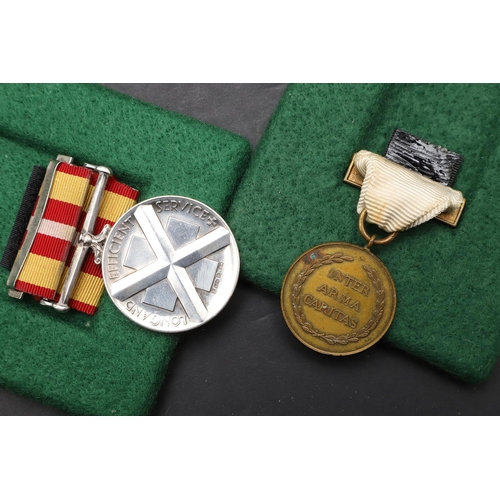 1020 - A COLLECTION OF NURSING MEDALS INCLUDING AN ORDER OF ST JOHN BREAST BADGE. The Order of St John of J... 