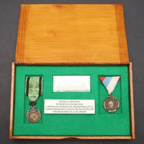 1021 - TWO TERRITORIAL NURSING SERVICES MEDALS ATTRIBUTED TO SISTER J.T. MITCHELL. A Commemorative Medal fo... 