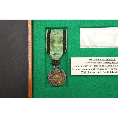 1021 - TWO TERRITORIAL NURSING SERVICES MEDALS ATTRIBUTED TO SISTER J.T. MITCHELL. A Commemorative Medal fo... 