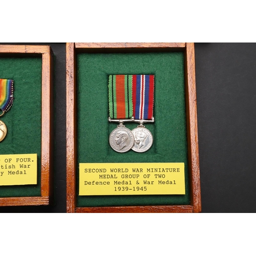 1025 - A COLLECTION OF MINIATURE MEDALS TO INCLUDE A MILITARY CROSS TRIO. A collection of miniature medals:... 