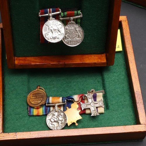 1025 - A COLLECTION OF MINIATURE MEDALS TO INCLUDE A MILITARY CROSS TRIO. A collection of miniature medals:... 