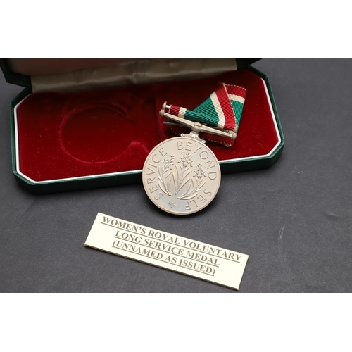 1028 - A FIRST WORLD WAR A.A. DEFENCES CADET MEDAL AND TWO OTHERS. An AA Defences medal engraved to the rev... 