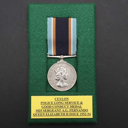 1032 - A CEYLON ELIZABETH II POLICE LONG SERVICE AND GOOD CONDUCT MEDAL. A Police Long Service and Good Con... 