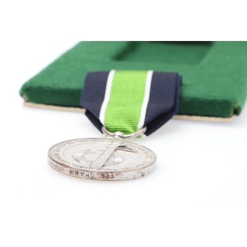 1033 - A GEORGE VI COLONIAL POLICE LONG SERVICE MEDAL. A George VI Colonial  Police Long Service Medal name... 