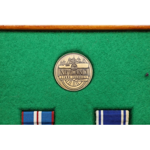 1035 - A PAIR OF MEDALS TO POLICE CONSTABLE KATHLEEN MATHIAS OF DYFED POWYS POLICE. A pair comprising Eliza... 