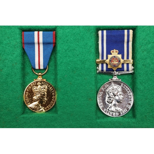 1035 - A PAIR OF MEDALS TO POLICE CONSTABLE KATHLEEN MATHIAS OF DYFED POWYS POLICE. A pair comprising Eliza... 