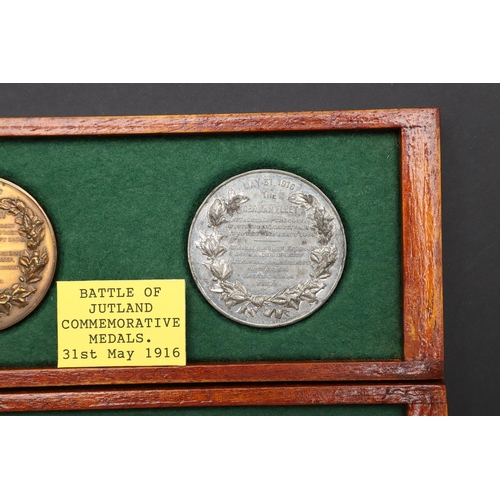 1039 - A LUSITANIA MEDAL AND TWO JUTLAND MEDALS. A Lusitania medal, British Iron issue after the German exa... 