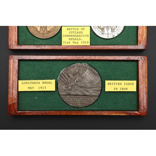 1039 - A LUSITANIA MEDAL AND TWO JUTLAND MEDALS. A Lusitania medal, British Iron issue after the German exa... 