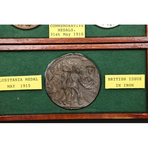 1039 - A LUSITANIA MEDAL AND TWO JUTLAND MEDALS. A Lusitania medal, British Iron issue after the German exa... 