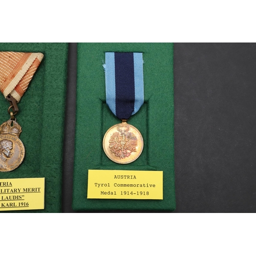 1041 - AUSTRIA: A COLLECTION OF FIVE AWARDS INCLUDING MEDALS OR MILITARY MERIT. A Medal for Military Merit,... 