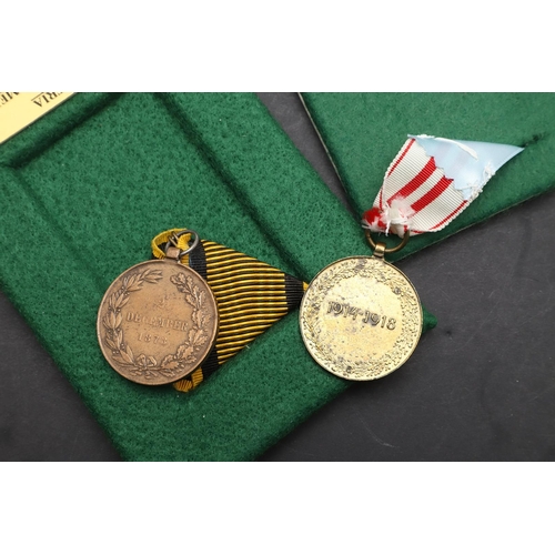 1042 - AUSTRIA: A COLLECTION OF FIRST WORLD WAR AND SIMILAR AWARDS. A collection of medals comprising Mobil... 