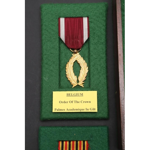 1053 - BELGIUM: A COLLECTION OF MEDALS INCLUDING LONG SERVICE AWARDS. A collection of medals comprising: Ki... 