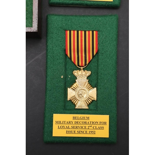 1053 - BELGIUM: A COLLECTION OF MEDALS INCLUDING LONG SERVICE AWARDS. A collection of medals comprising: Ki... 