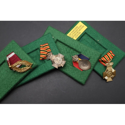 1053 - BELGIUM: A COLLECTION OF MEDALS INCLUDING LONG SERVICE AWARDS. A collection of medals comprising: Ki... 