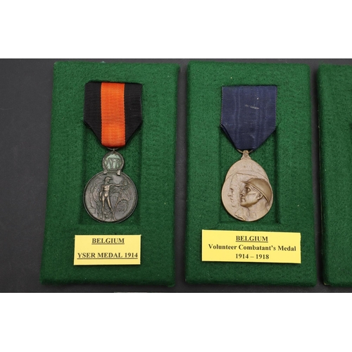 1054 - BELGIUM: A COLLECTION OF FIRST WORLD WAR MEDALS. First World War Belgian medals including a Yser cro... 