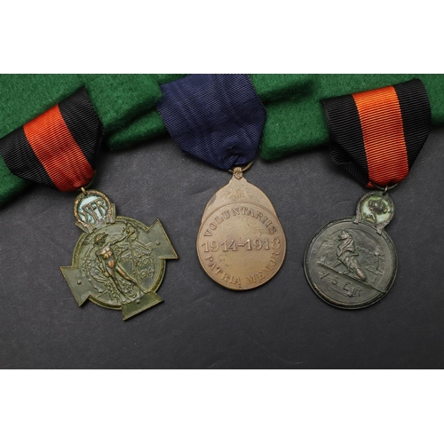 1054 - BELGIUM: A COLLECTION OF FIRST WORLD WAR MEDALS. First World War Belgian medals including a Yser cro... 