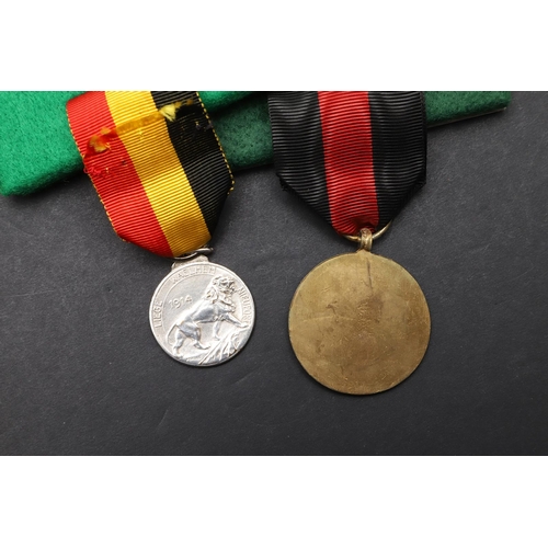 1054 - BELGIUM: A COLLECTION OF FIRST WORLD WAR MEDALS. First World War Belgian medals including a Yser cro... 