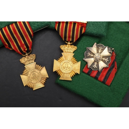 1058 - BELGIUM: A COLLECTION OF LONG SERVICE AWARDS. The Military Decoration of loyal service 1st class, Ki... 