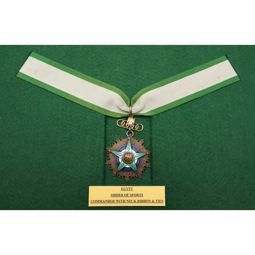 1069 - EGYPT: ORDER OF SPORTS, COMMANDER'S NECK BADGE. The Egyptian Order of Sports, a green, white, blue a... 