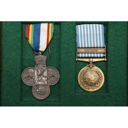 1071 - ETHIOPIA: KOREAN WAR MEDAL PAIR. An Ethiopian Korean War Medal, Court Size (52 x 67 mm) and a United... 