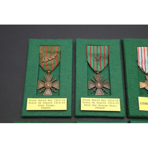 1088 - FRANCE: A COLLECTION OF FIRST WORLD WAR CROIX DE GUERRE. A collection of eight Croix De Guerre to in... 