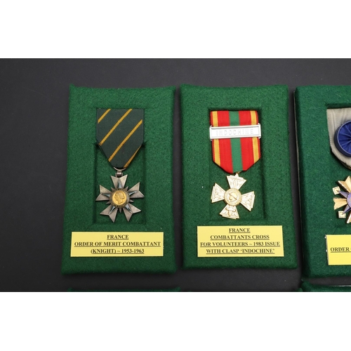 1090 - FRANCE: A COLLECTION OF POST WAR AND FRENCH COLONIAL MEDALS. Two examples of the French Order of the... 