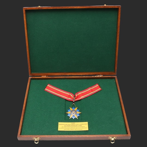 1098 - GABON ORDER OF THE EQUATORIAL STAR, COMMANDER'S NECK BADGE. A six pointed yellow enamel star against... 