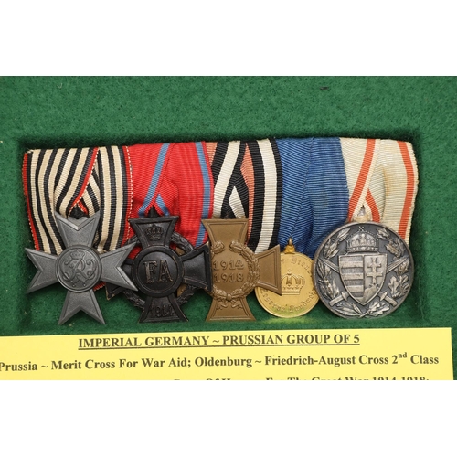 1110 - IMPERIAL GERMANY: A PRUSSIAN MERIT CROSS GROUP OF FIVE. A group of five comprising Prussian Merit Cr... 