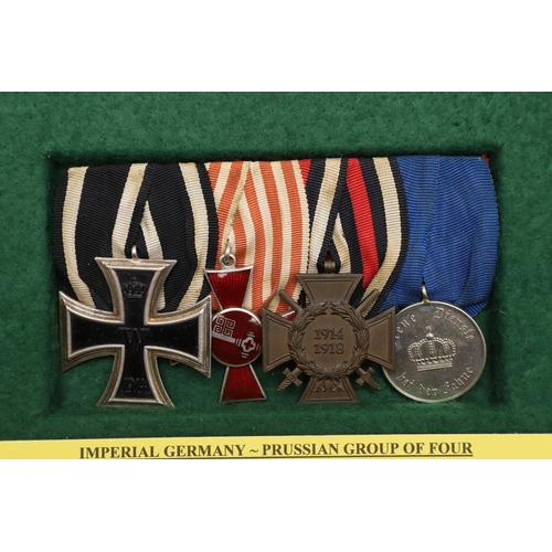 1114 - IMPERIAL GERMANY: A PRUSSIAN IRON CROSS GROUP OF FOUR. A group of four comprising Iron Cross, second... 