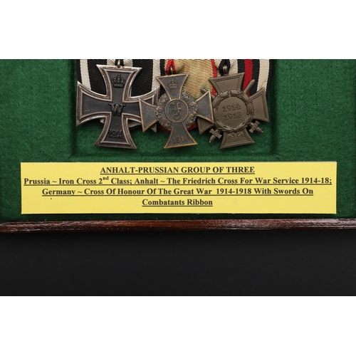 1115 - IMPERIAL GERMANY: A PRUSSIAN IRON CROSS GROUP OF THREE. A group of three comprising Prussian Iron Cr... 