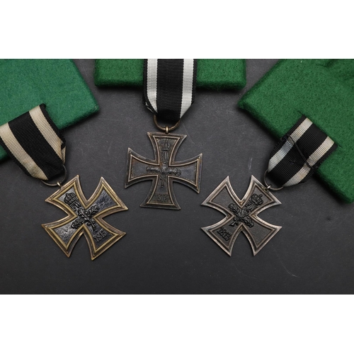 1121 - IMPERIAL GERMANY: THREE FIRST WORLD WAR PRUSSIAN IRON CROSSES. A collection of Prussian Iron Crosses... 