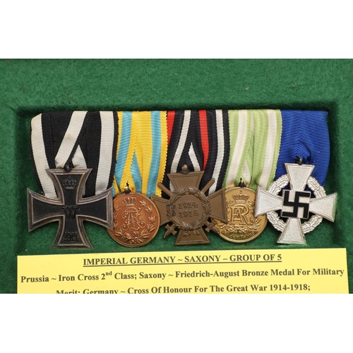 1125 - IMPERIAL GERMANY: A SAXONY IRON CROSS GROUP OF FIVE. A group of five comprising Iron Cross, second c... 